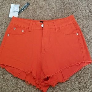 NWT Orange Jean shorts size l (juniors)